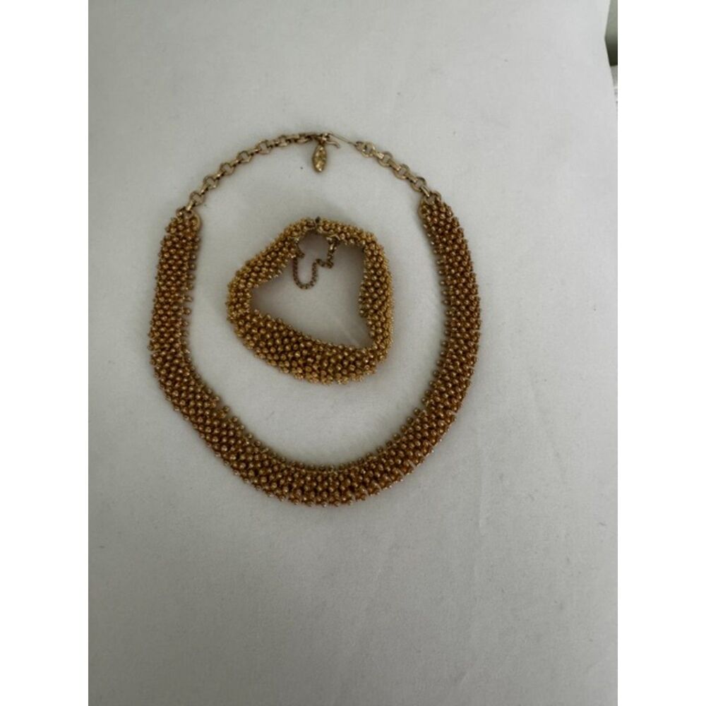 Vintage 1950-1960 signed Coro popcorn necklace and bracelet set.